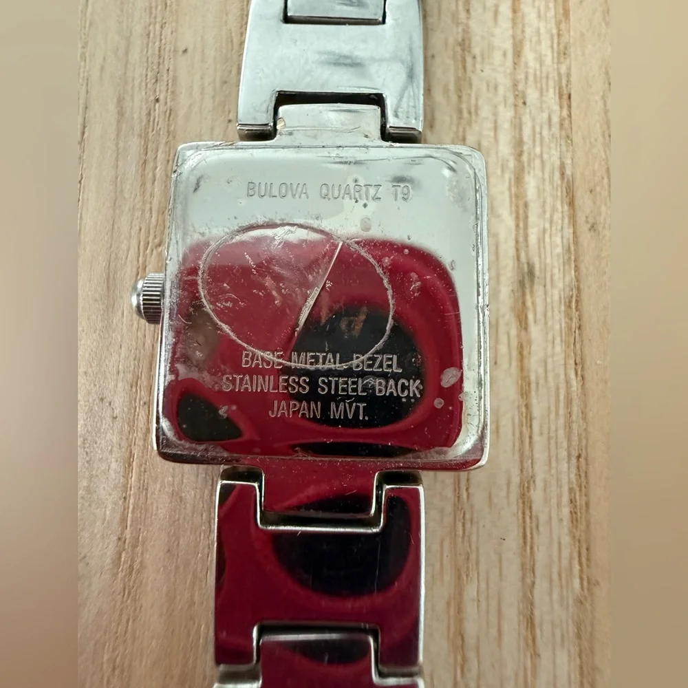 Dainty Bulova ladies square silver tone watch NEW BATTERY